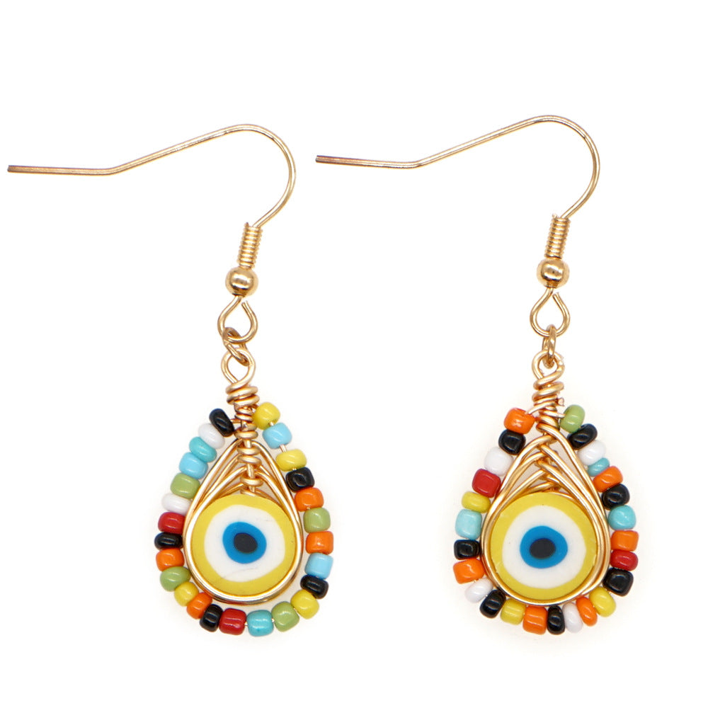 Joyas al por mayor Pendientes de cuentas de arroz de ojos étnicos